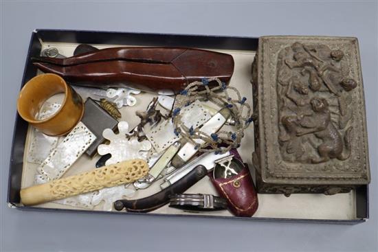 Three Victorian silver bladed fruit knives, a tortoiseshell eye glass, treen nutcrackers etc.